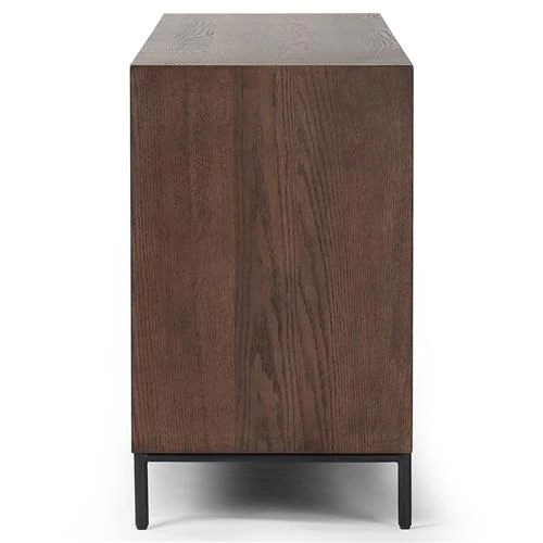 Close-up of wooden cabinet side panel showing wood grain and metal leg.