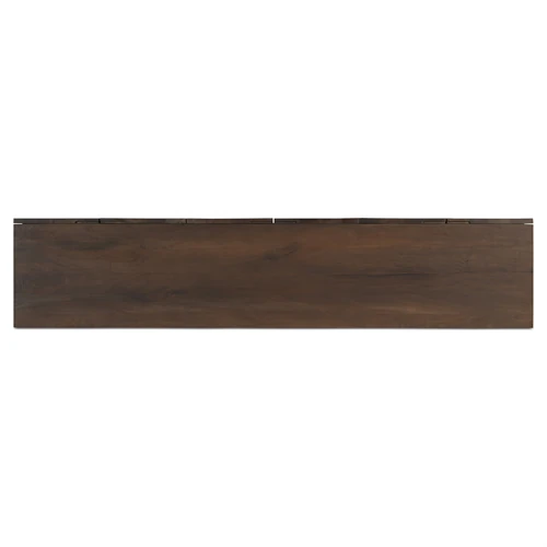 Long dark wood panel of sideboard top, no visible hardware.