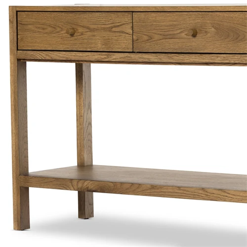 Close-up of one leg and bottom shelf of the console table.