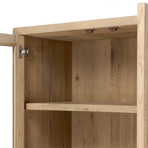 Inside of a wooden cabinet showing shelf and hanging hardware