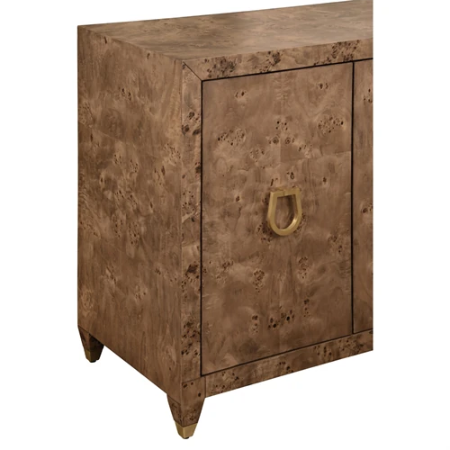 Front view of a single burl wood cabinet door with a brass handle.