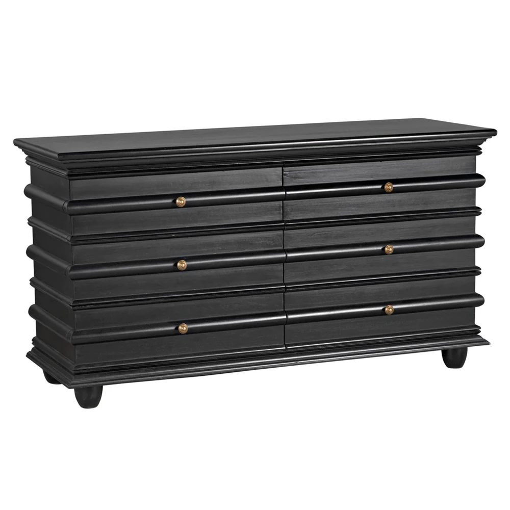 Bottom corner with rounded foot on black dresser and visible grain in wood finish.