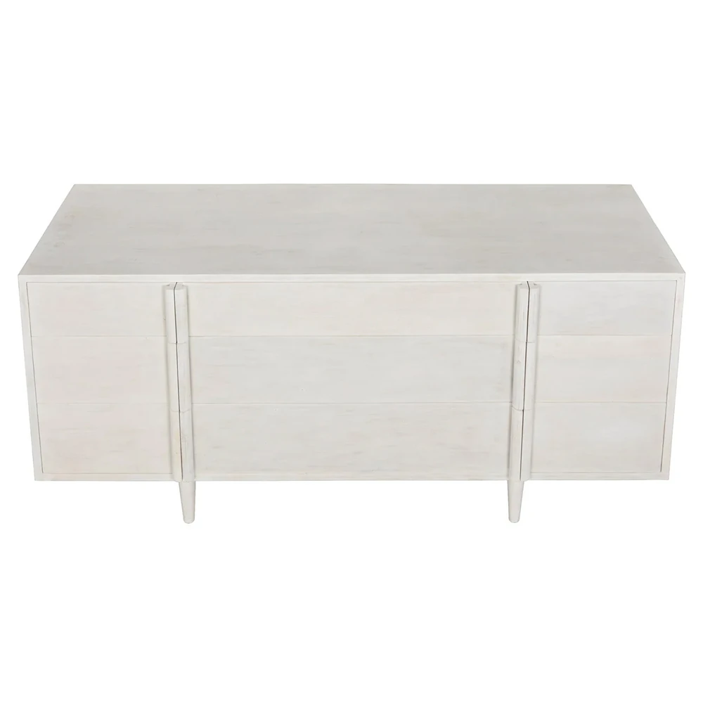 A white dresser with six drawers from the front