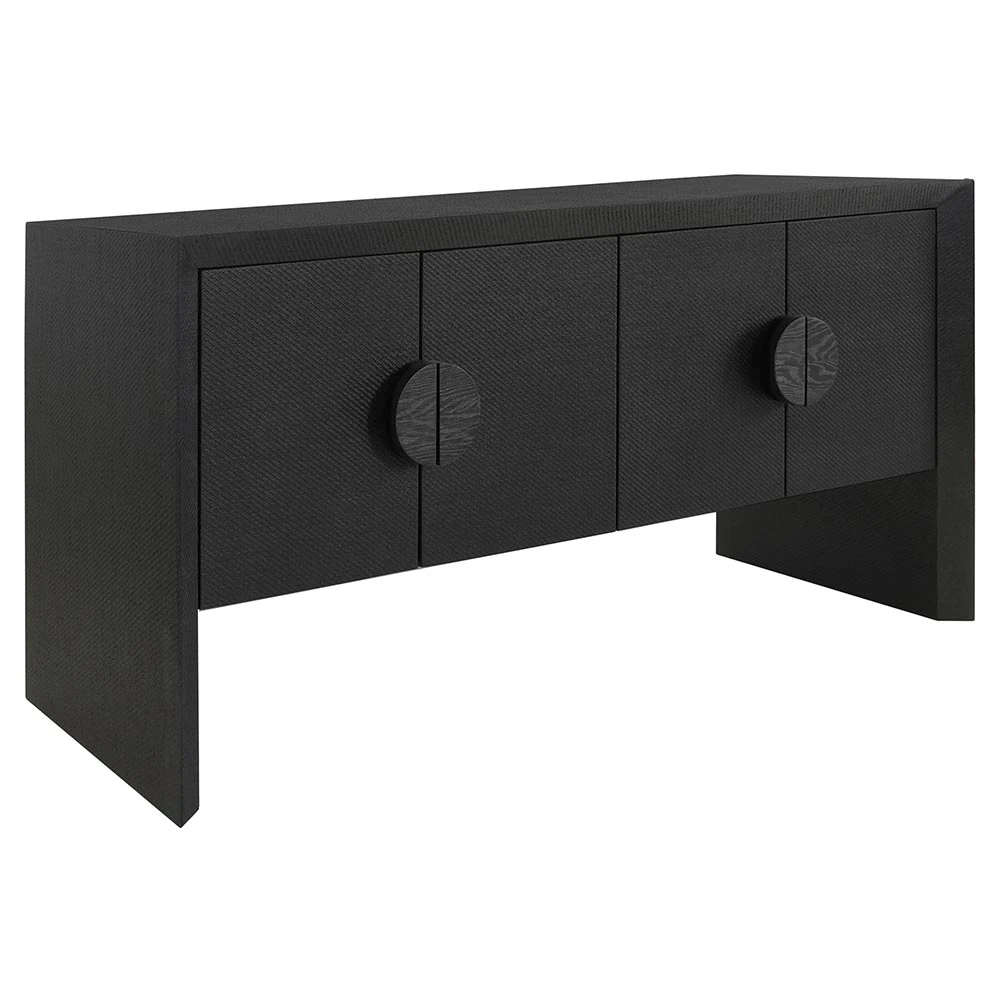 Close-up of the textured surface and round knob on the cabinet door showing disk shape and split seam.