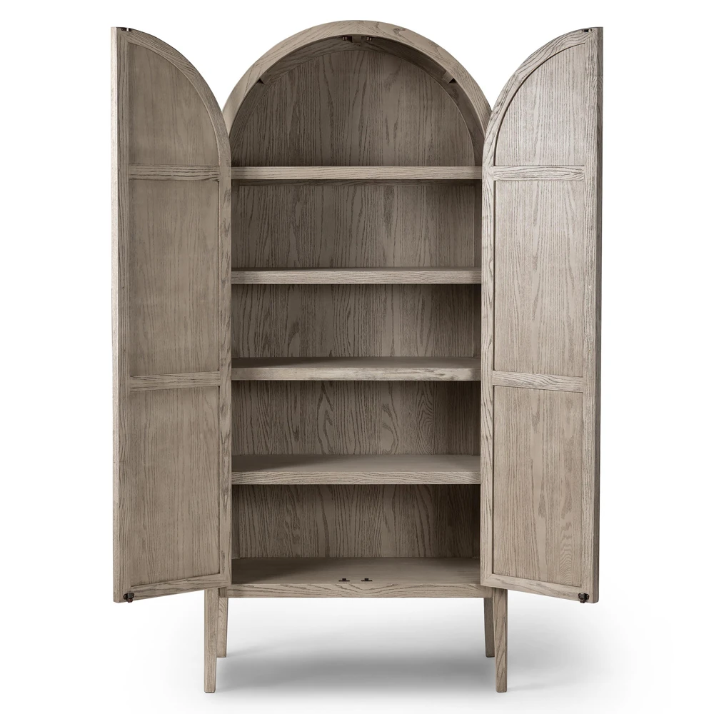 Open cabinet showing interior shelves, arched top, same washed wood finish.
