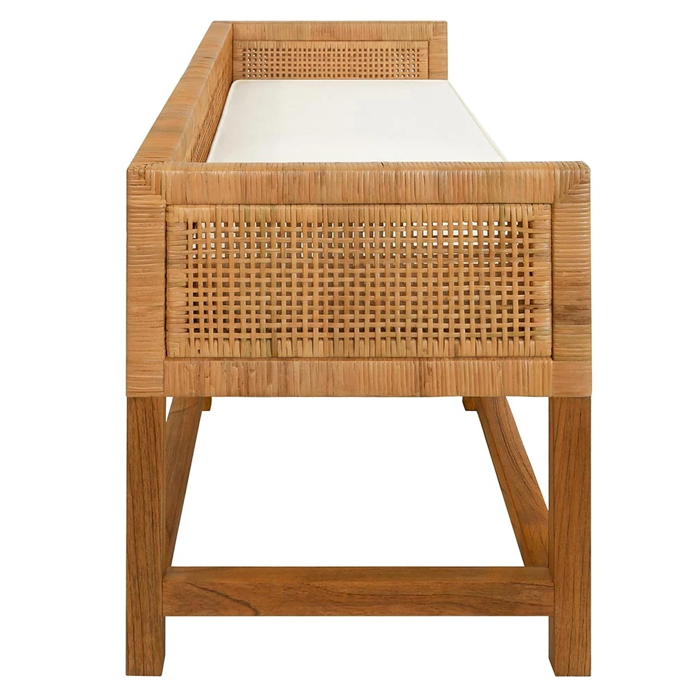 Close-up of the woven cane detail and corner join of the wooden bench.