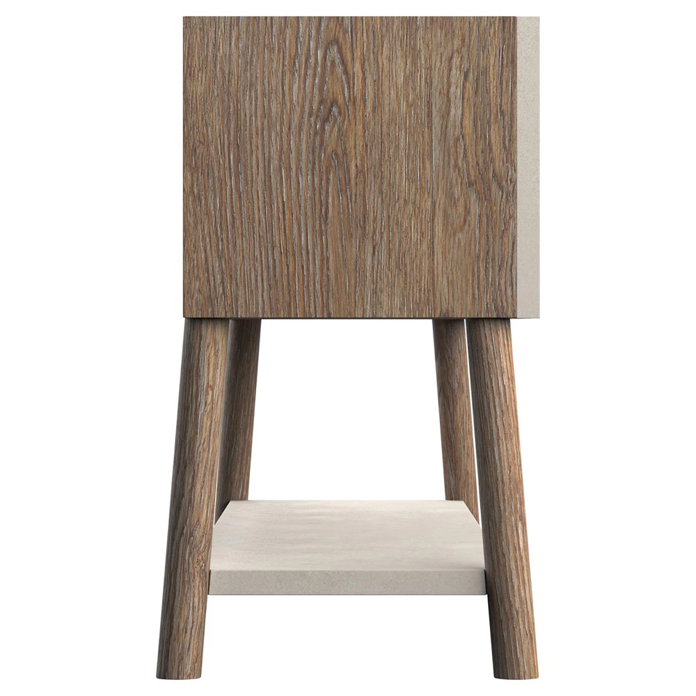 A close-up of a modern textured sideboard showing abstract stone-like panels and wooden legs.