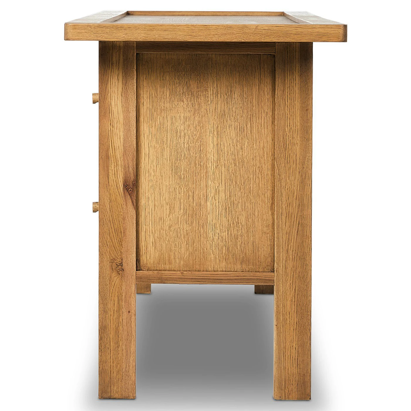 Close-up of the sideboard edge and corner showing smooth joinery and rounded corner.