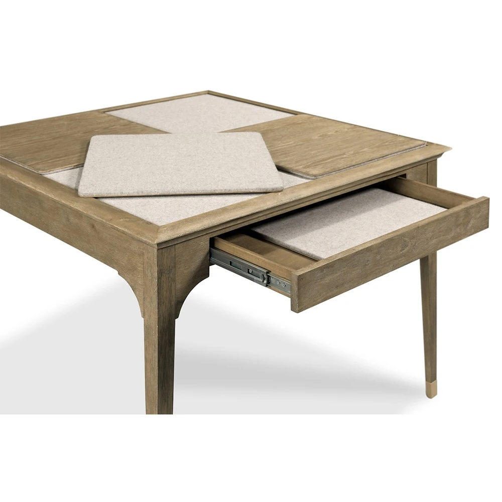 A wooden desk with a beige top and one drawer, shown with the drawer open