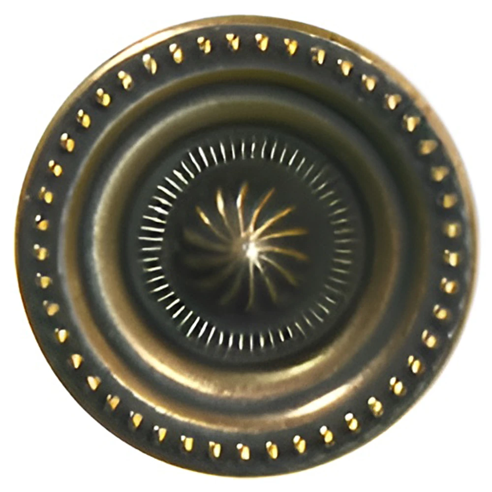 A close-up of a cabinet knob.