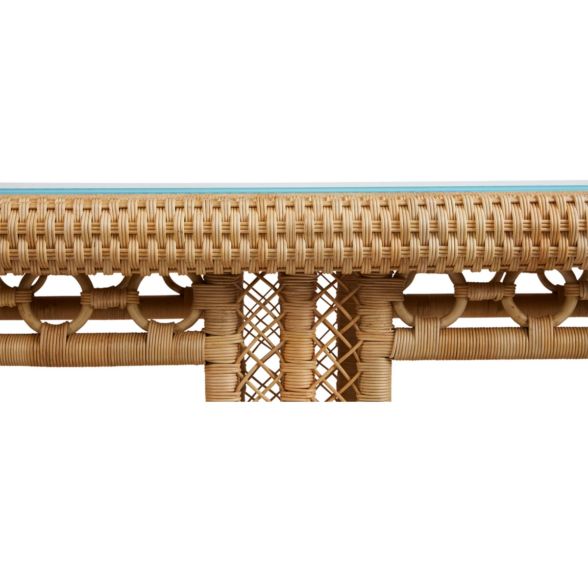 Diagonal close-up of wicker weave along edge of table highlighting braided trim.