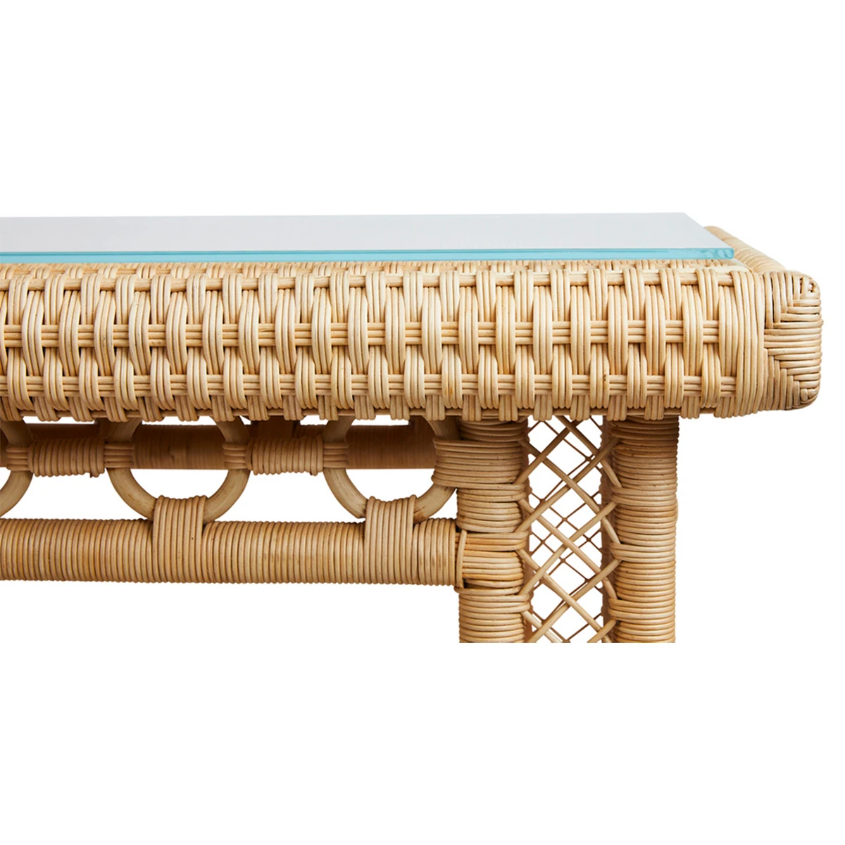 Holiday-sized vantage of tropical bar setup with two-tier wicker console table and decor.