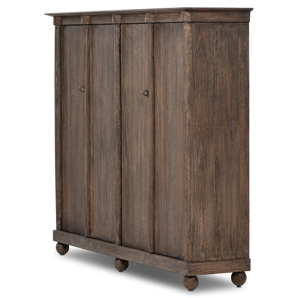 Wooden cabinet base and round foot, showing weathered wood grain and sturdy construction.