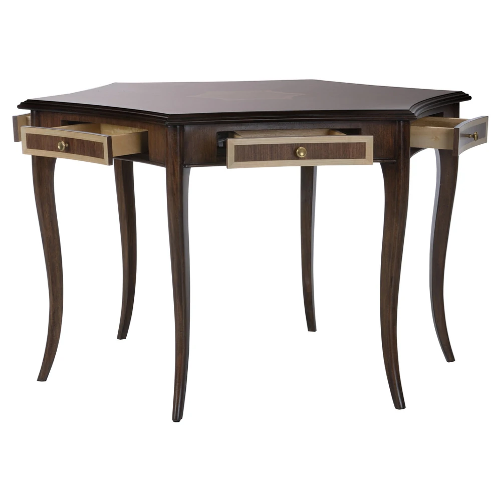 A dark brown wooden desk with curved legs and three drawers, with the drawers pulled out.
