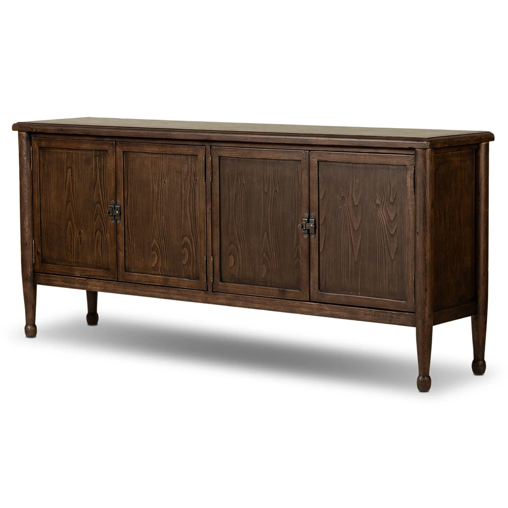 Close-up of cabinet doors showing wood grain and metal hinge hardware, dark brown finish.