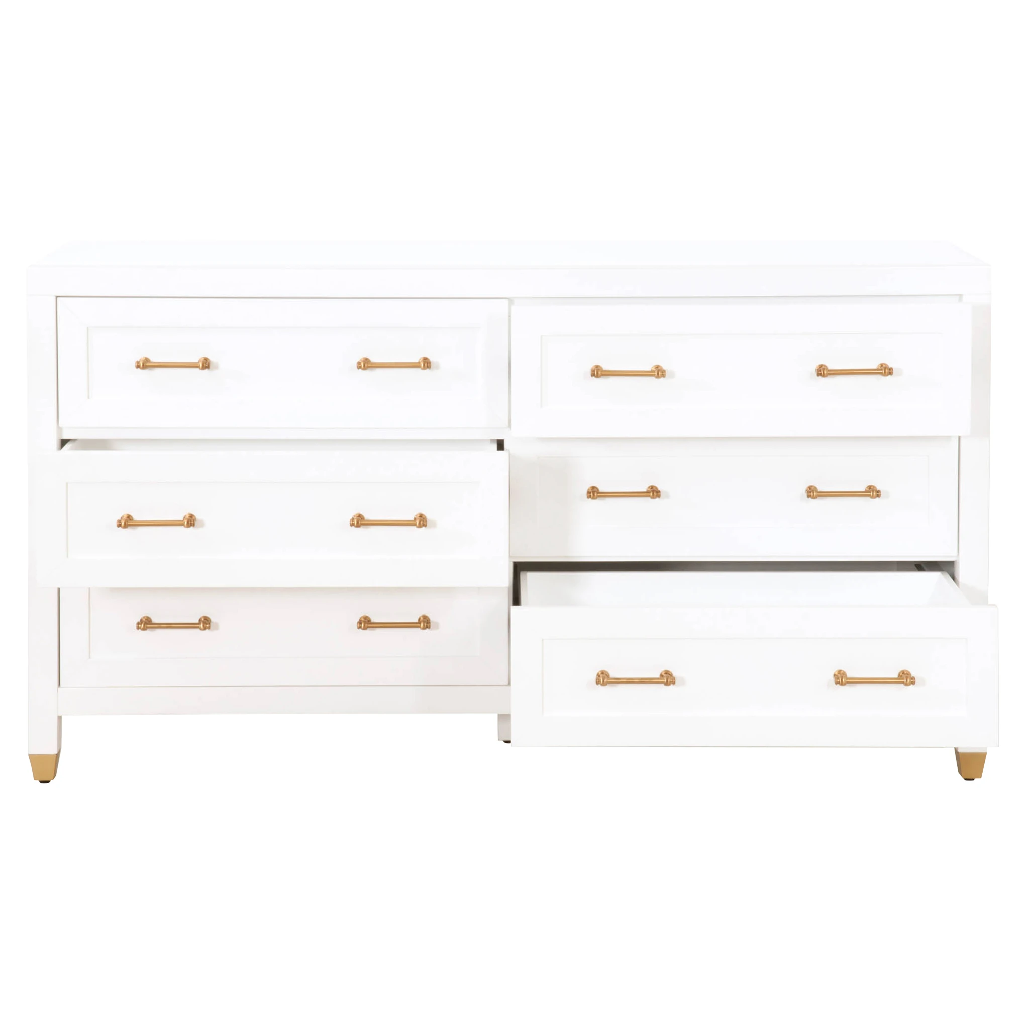 Close-up of a gold-toned drawer pull on a white dresser panel.