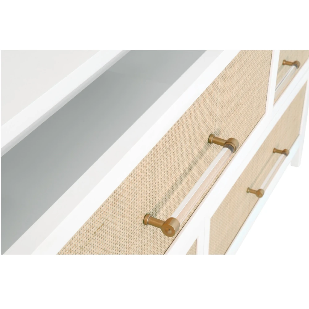 a close-up of the interior of one drawer and the woven rattan front of another