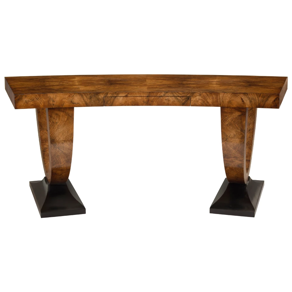 The far end of the wooden table with a rectangular top and curved legs.