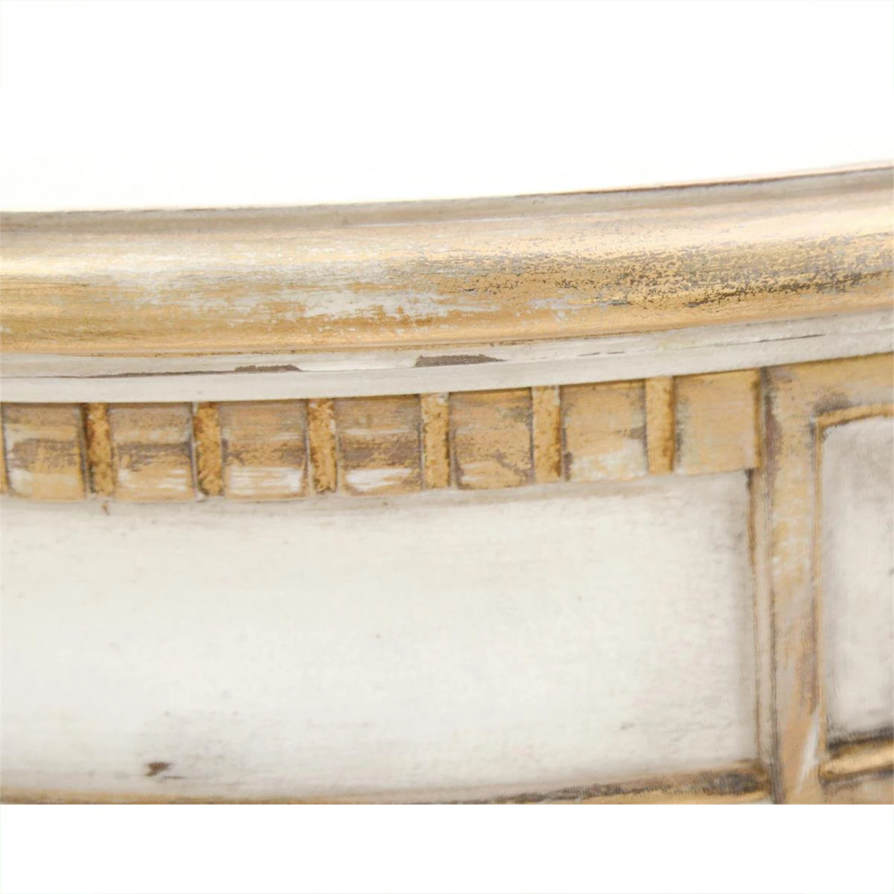 A close-up of the side table's rim, showcasing its white and gold details.