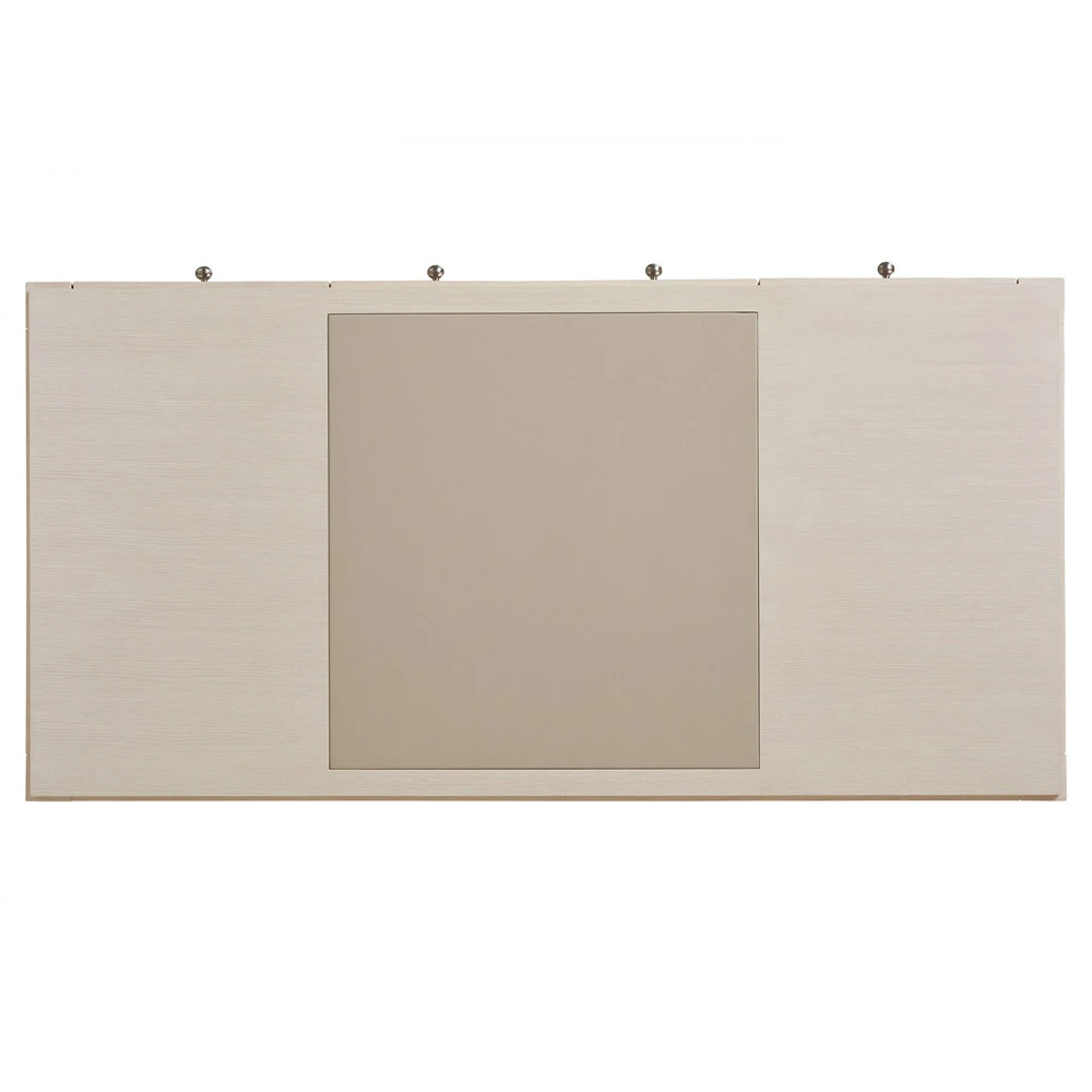 The back of a beige panel with four screws.