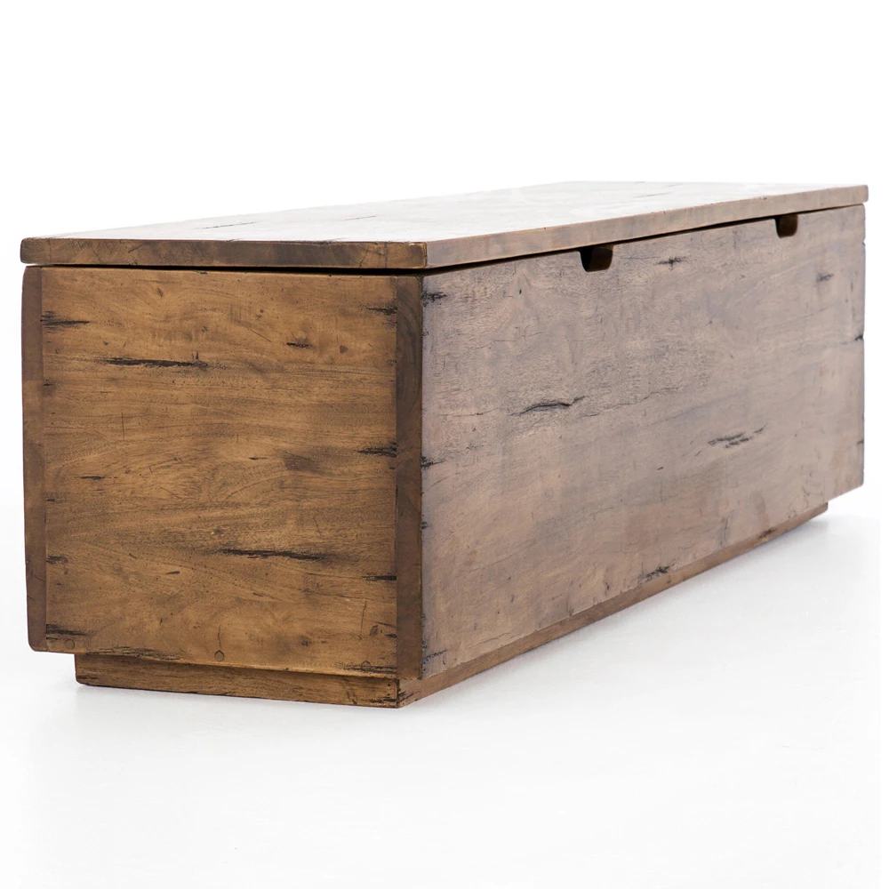 Close-up of the bench's corner showing wood grain, joinery, and sturdy build.