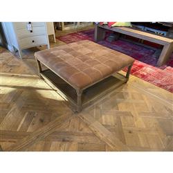 Ishan Rustic Lodge Brown Upholstered Leather Solid Oak Wood Tufted Ottoman|