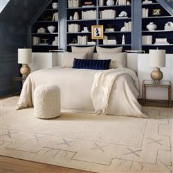 Ezekiel Modern Classic Cream Round Pouf|