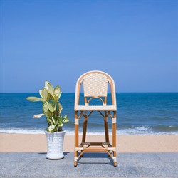 Hayden Coastal Beach Beige Woven Faux Wicker Outdoor Armless Counter Stool|