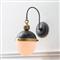 Otis Industrial Black Steel Natural Brass Accent Armed Sconce