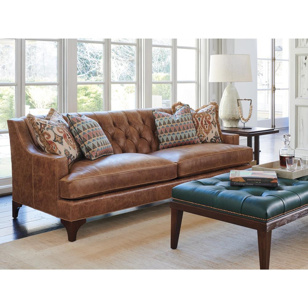 leather sofa with fabric cushions