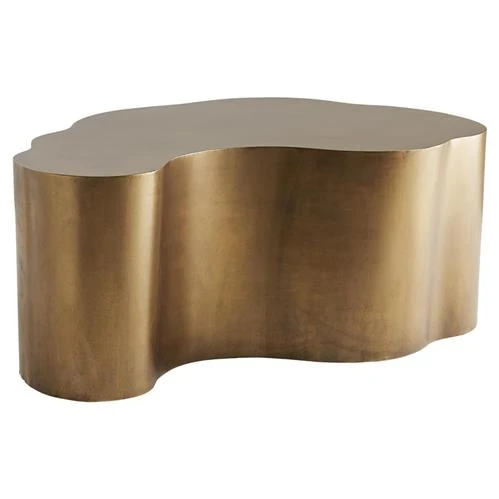 Bronze irregularly shaped rug or decorative mat with organic blob form.